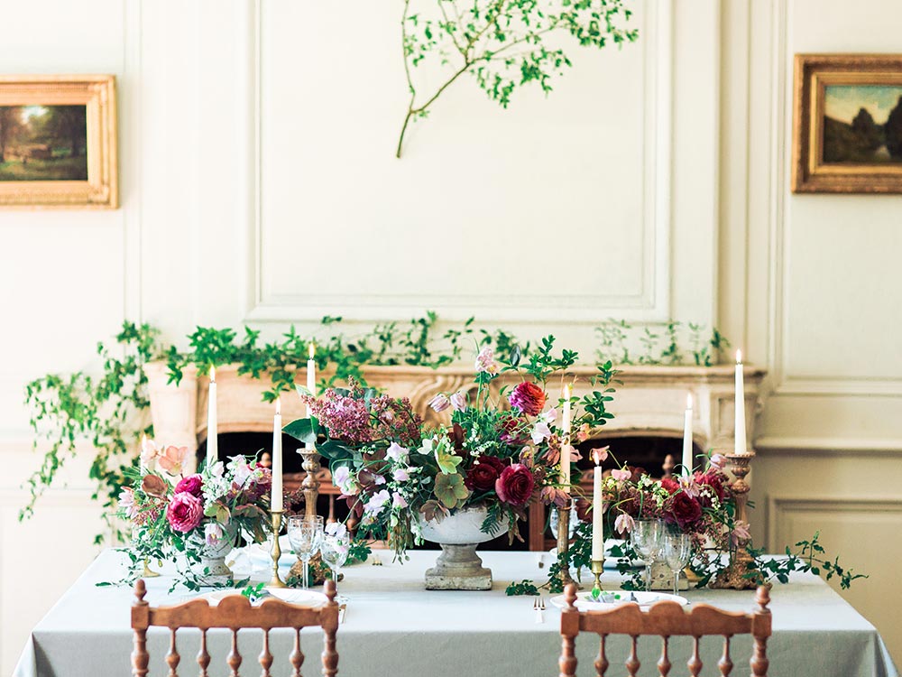A wedding table set up in the Grand Gallery of Montplaisant Castle—an example of a successful reception.