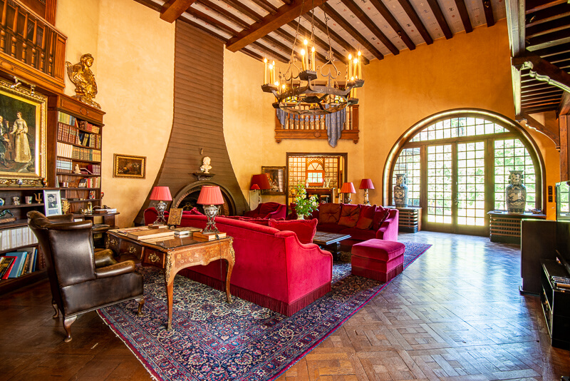 Large living room with a library