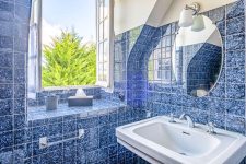 Salle d'eau avec baignoire de la Junior suite Mirage